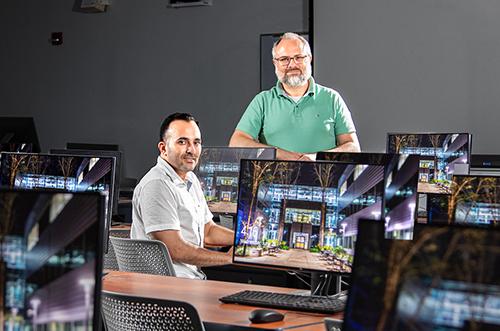 photo of engineering researchers arda vanli and mohammadreza koloushani in the computer lab