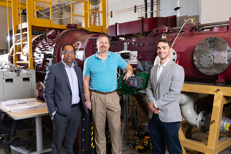 photo of famu-fsu aerospace engineering professors in front of wind tunnel