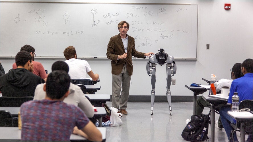Assistant Professor Christian Hubicki, Ph.D. with his robot Tallahassee Cassie, talk to Jorge Campa's Dynamic Systems ll class at the FAMU-FSU College of Engineering in Tallahassee, Florida.