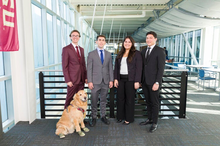 Members of Team 402 left to right: Joshua Davey (MAE), Christian Kennedy (IME), Sunshine McDonald (IME), Nicolas Rossi (IME)