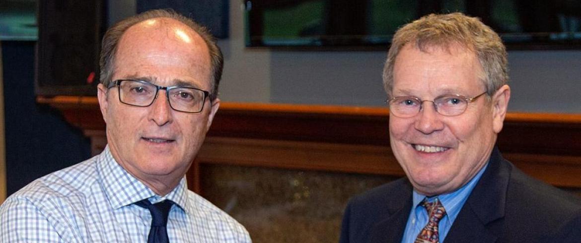 Eric Hellstrom, Ph.D. gives Joel Wayne House the Chair's Service Award during the 2019 Department of Mechanical Engineering Alumni Awards Banquet.