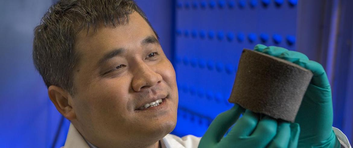 Chad Zeng Ph.D. holding new foam