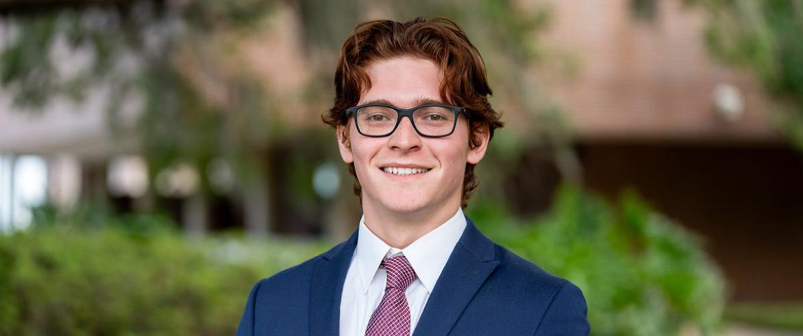headshot of undergrad engineering student with red hair and glasses as florida state university