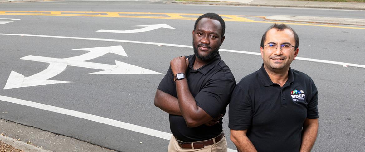photo of famu-fsu engineering researchers antwi and ozguven in a turn zone with road markings