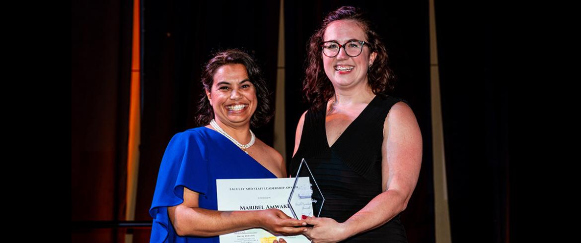 photo of amwake getting award