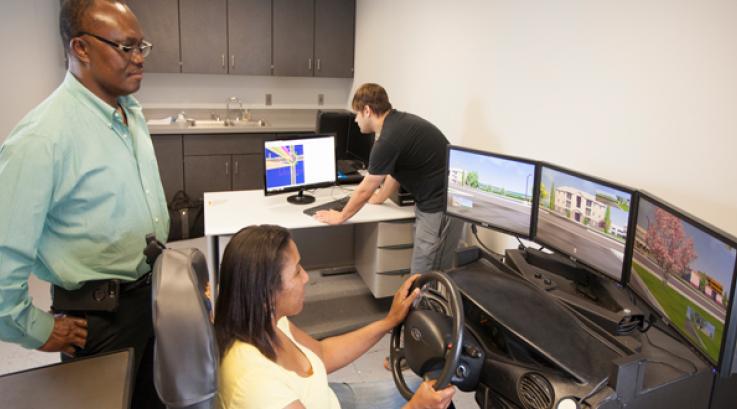 participant driving a simulation program created by ASAP
