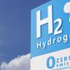 photo illustration of a hydrogen sign with zero emissions type