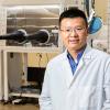 photo of engineering researcher zhibin yu in lab at famu-fsu engineering
