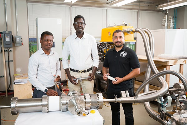 electrical and computer engineering graduate students in the lab at caps